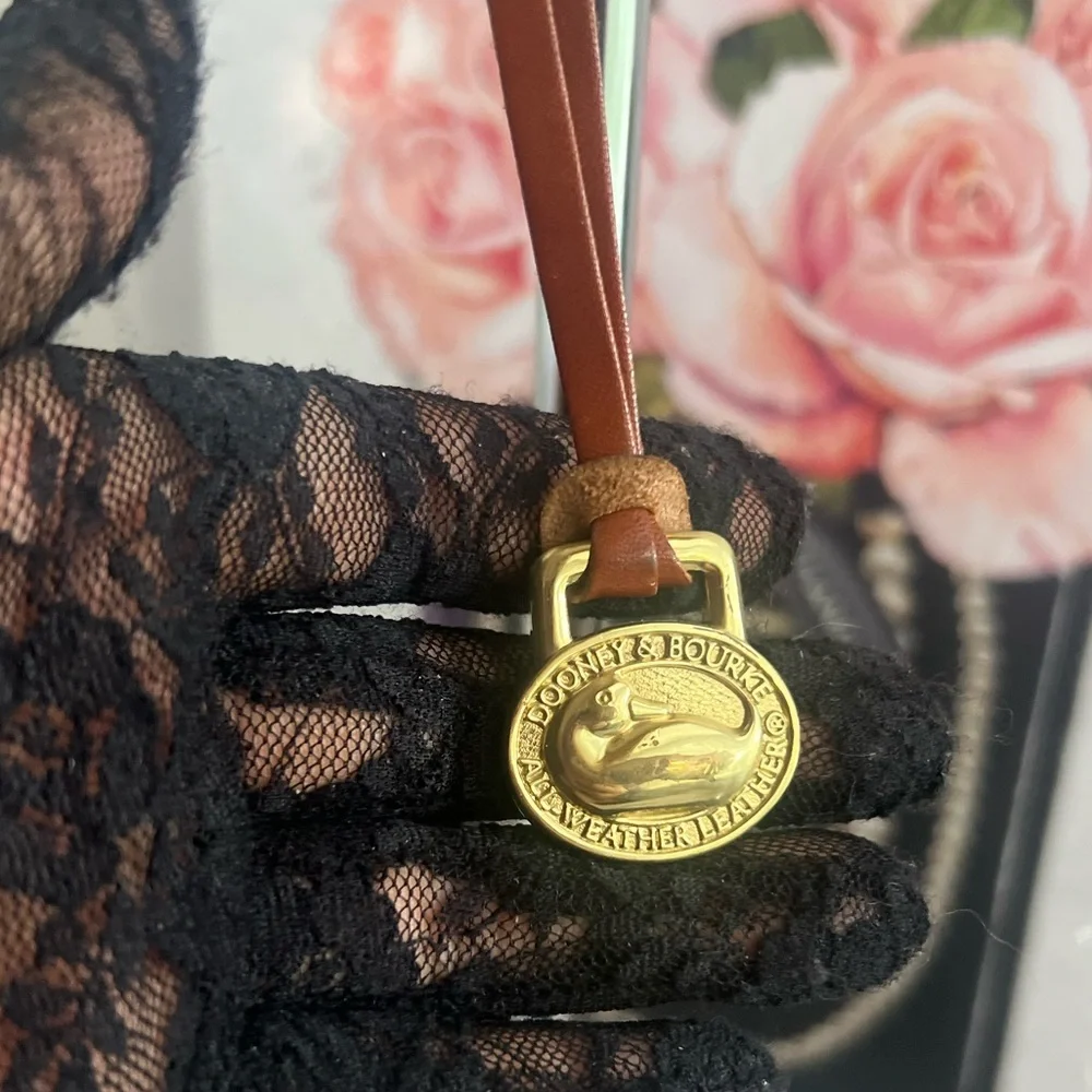 Dooney & Bourke  vintage Brown Leather Keychain with Gold Accent